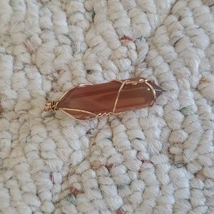 amber stone with wire charm